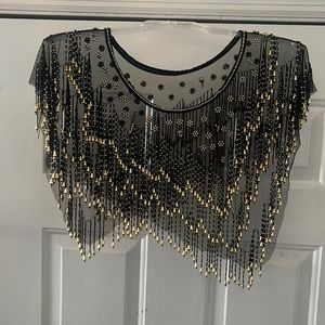 Vintage sheer shirt. Pair with a cute skirt or jeans!